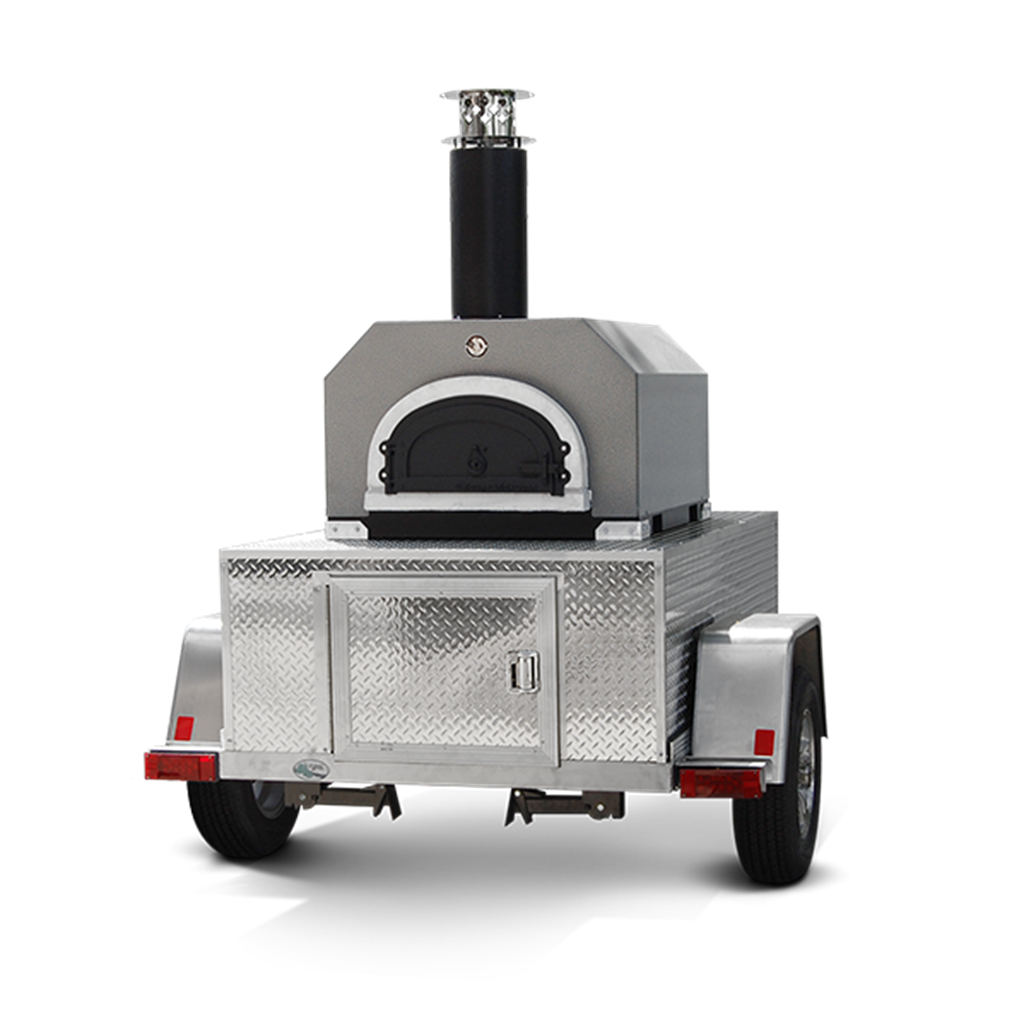 The Chicago Brick Oven CBO 750 Tailgater is a mobile wood-fired pizza oven mounted on a metallic trailer. The oven features a cylindrical chimney atop and a black, arched door. The trailer includes diamond-plate metal siding with a storage compartment beneath the oven, making it one of the most versatile outdoor pizza ovens available. It boasts a 38" x 28" cooking surface capable of baking 2-3 ten-inch pizzas at once and up to 50-60 pizzas per hour.